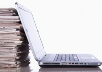 Papers and laptop_iStock Photo