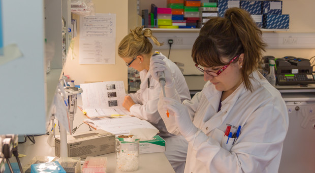 Bryony and her PhD student in the lab.
