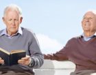 Retired senior man reading a novel – Outdoor