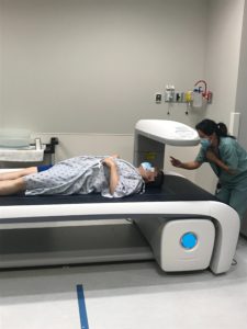 Participant undergoing a dual-energy X-ray absorptiometry (DXA) scan
